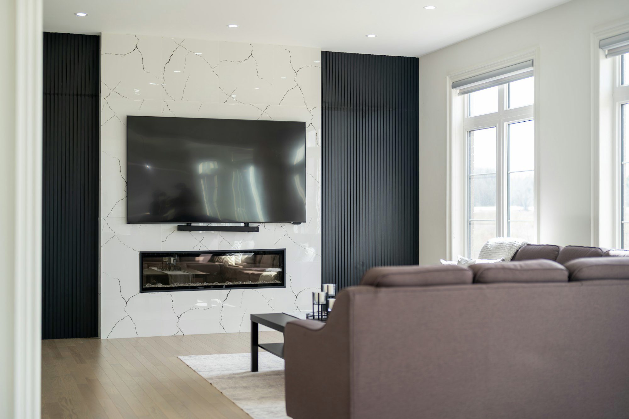 75" TV on Stone Fireplace